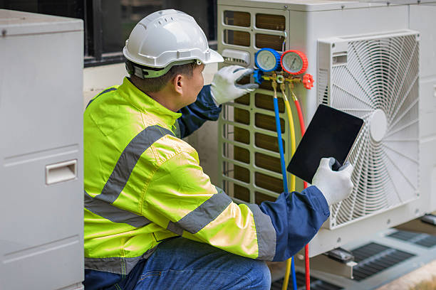 Professional Hvac technician working in Barlow, KY